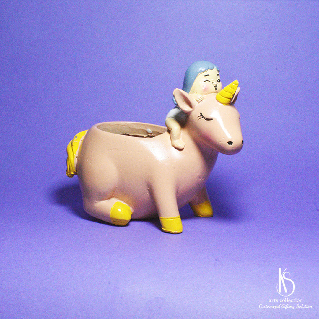 Discover your new favourite planter at our online gift shop! Our KS Cute Unicorn with Girl Resin Pot is a personalised gift for any green thumb.