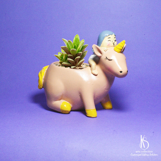 At our online gift shop, you'll find the perfect personalised gift. Try the KS Cute Unicorn with Girl Resin Pot - a planter designed to brighten up any room.