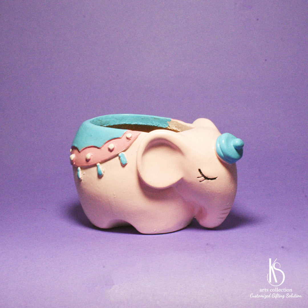 Brighten up a loved one's day with our KS Dreaming Pink Elephant Resin pot planter from our online gift shop. Ideal personalised gift to cheer up any home décor