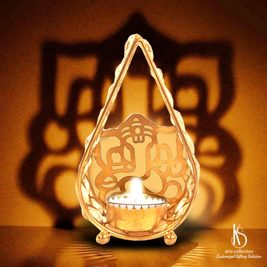 Make someone's day special with our exquisite metal Ganesha tealight candle holder. Shop from our online gift shop for unique personalised gifts.