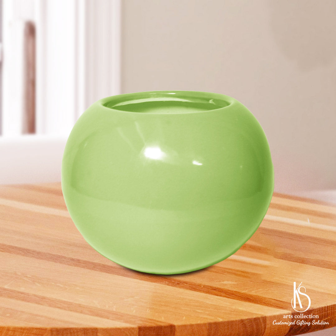 Elevate your indoor gardening game with our KS Round Ceramic Pot. Perfect as a customized gift or herb planter from our Online Gift Shop!