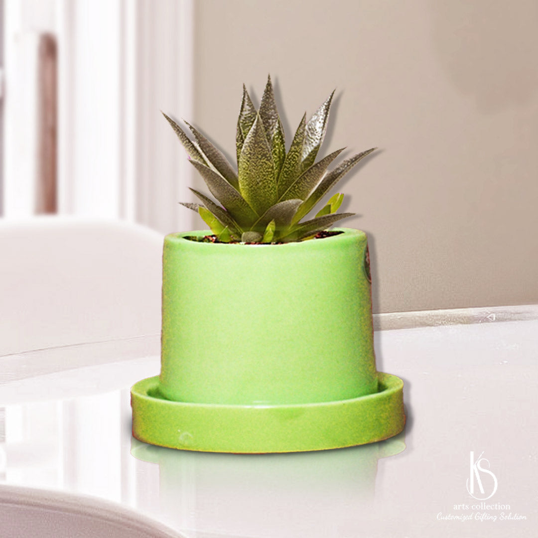 Looking for a thoughtful gift? Our KS Round Planter with plant saucers, available in our online gift shop, can be customized gift for a special touch.