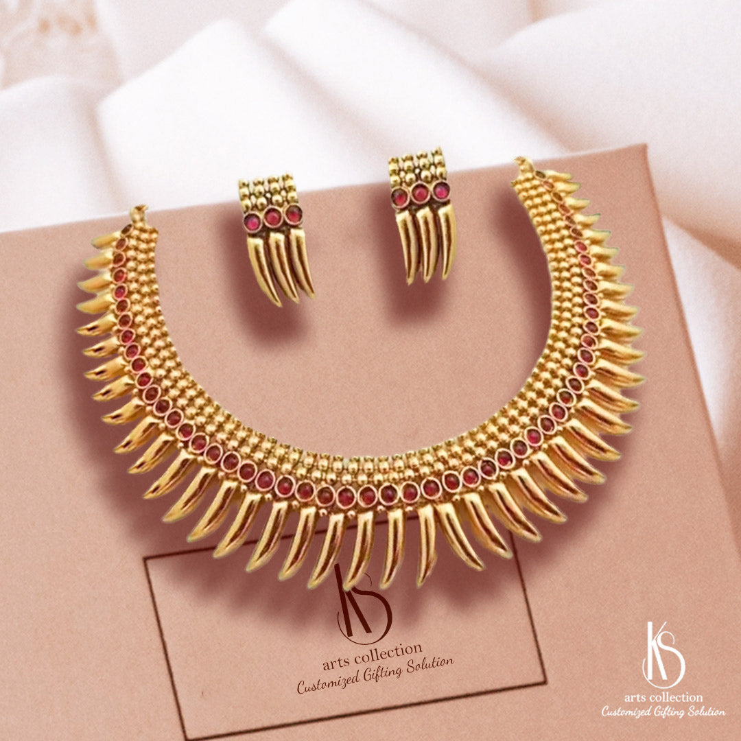 Wow your loved ones with this stunning KS South Indian Jewellery Set, available at our online gift shop. Make it a customized gift by adding a personal touch to this classic piece.