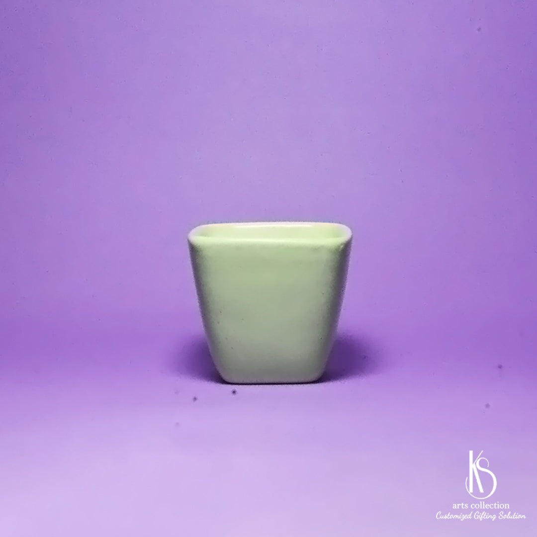 Add a touch of green to your home with our KS Tiny Ceramic Pot Planter. Create your very own herb garden and enjoy fresh flavors year-round. Available at our Online Gift Shop!