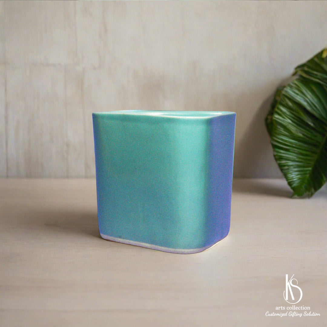 Surprise someone special with our KS Triangular Trikon ceramic planter, a thoughtful and personalised gift for any occasion. Great for growing herbs, available at our online gift shop.