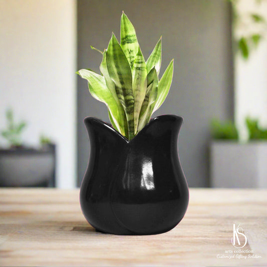 Explore our Online Gift Shop and discover our KS Tulip Ceramic Planter. This delightful piece makes a lovely personalised gift, and doubles as a great herb planter.