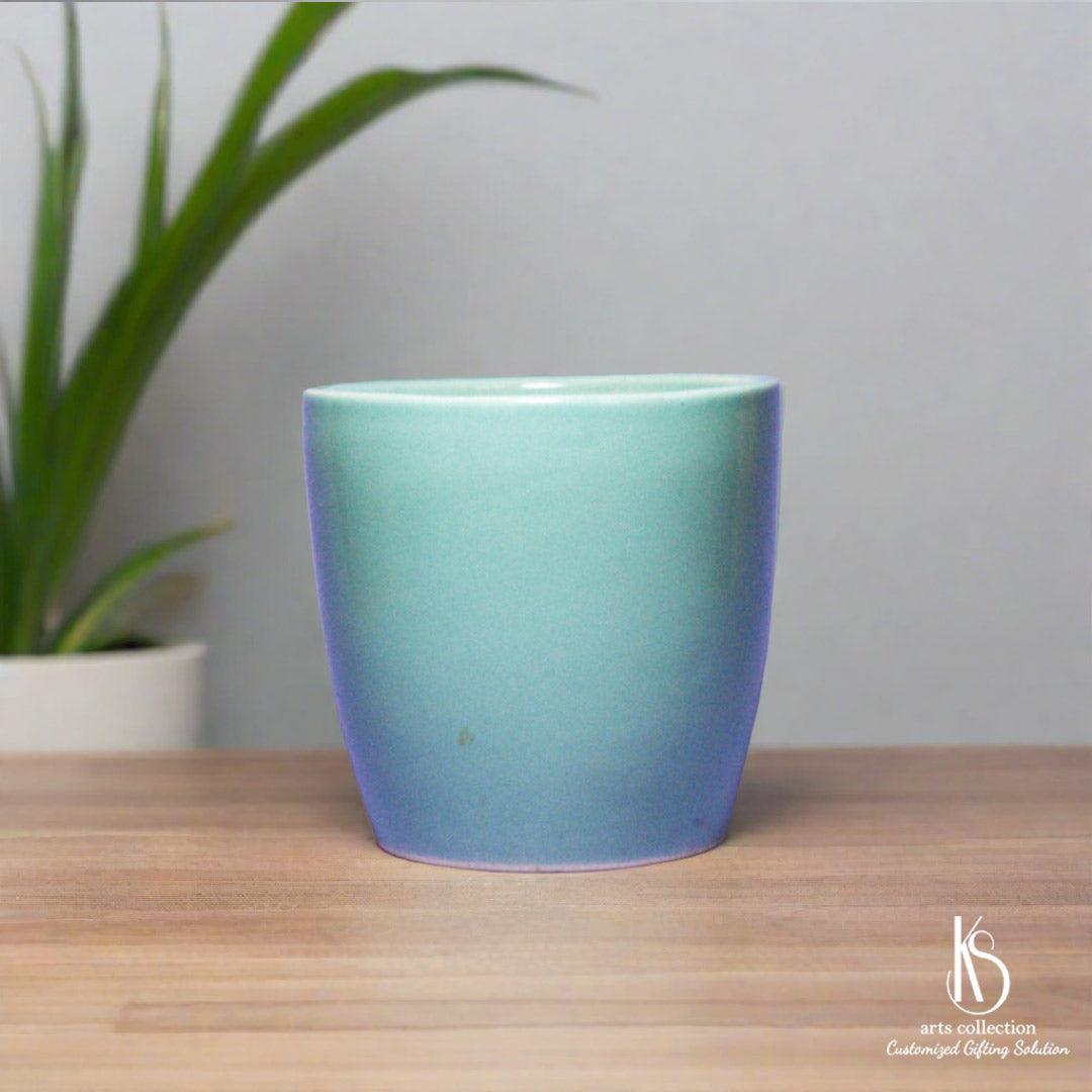 Discover the perfect personalised gift for a green thumb! Our KS Stunning Classic Ceramic Planter is ideal for herbs and adds charm to any space. Shop now at our online gift shop!