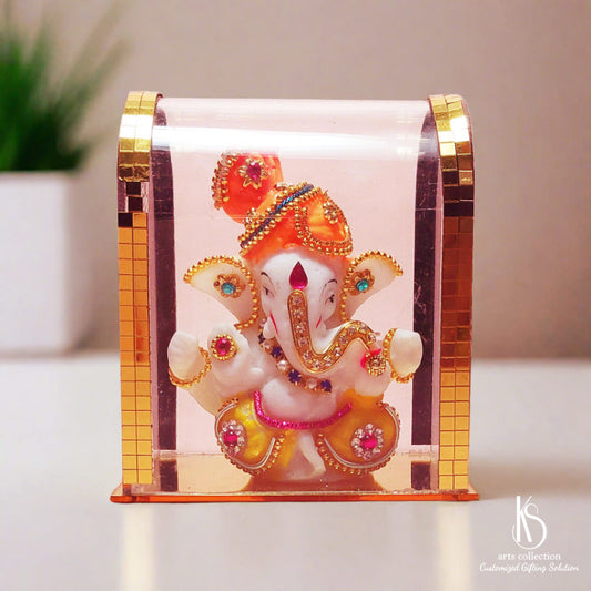 Looking for a special customized gift? Our Little KS Ganesh idol in glass is a unique option. Shop now at our online gift store and spread joy and blessings