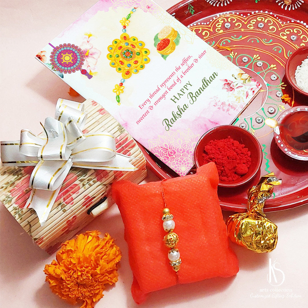 Experience the joy of gifting with KS Sweet Treasure Rakhi Gift Hamper from our online gift shop. A personalised gift to make Rakhi extra special.